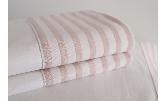 Top sheet with pillows in...