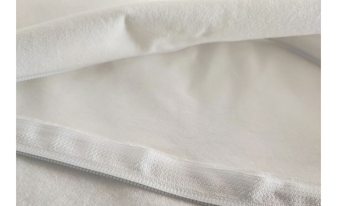 Protecteur de coussin respirant