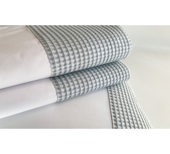 Top sheet with pillows in...