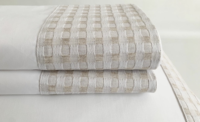 Top sheet with pillows in...