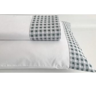 Top sheet with pillows in...