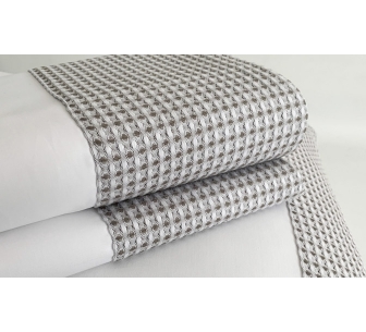 Top sheet with pillows in...