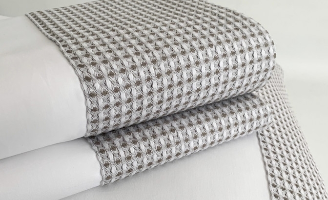 Top sheet with pillows in...